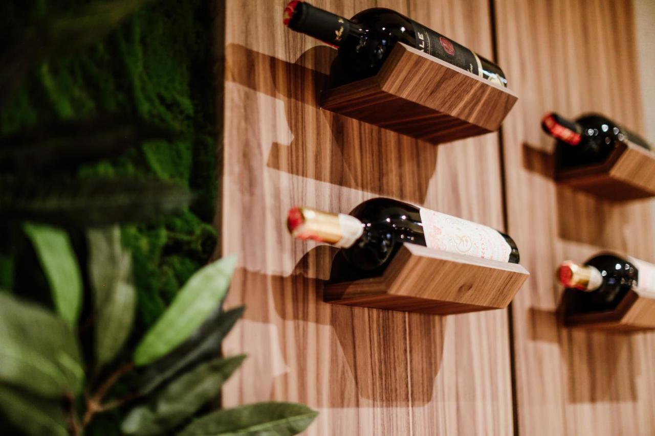 Klajdi Resort & Spa ゴーレム エクステリア 写真 Wine bottles stored on a wall mounted wine rack